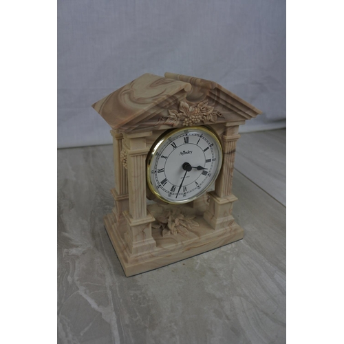 147 - A stunning Aynsley Portlandware mantle clock, Approx 13x16x8cm.