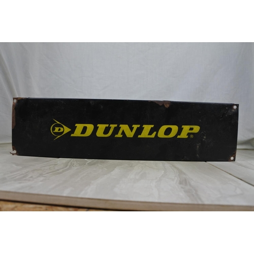 149 - A Dunlop metal sign, Approx 46x12cm.