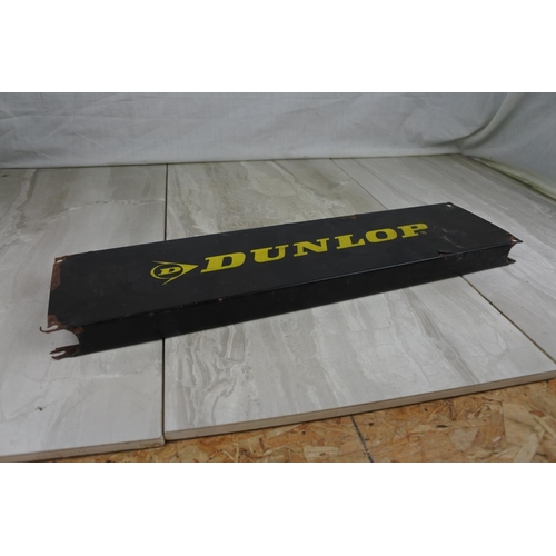 149 - A Dunlop metal sign, Approx 46x12cm.