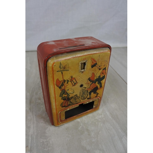 152 - A vintage tin plate money box (a/f).