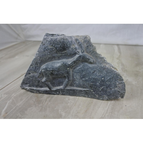 155 - An unusual stone carving of an animal, Approx 18x10cm.