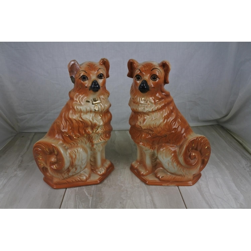 156 - A stunning pair of antique mantle dogs (a/f), Approx 33cm in height.