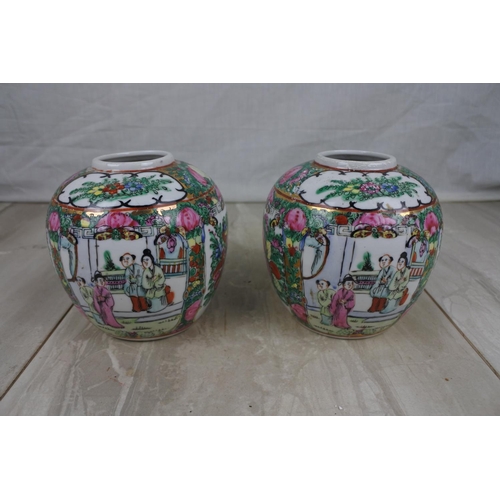 163 - A pair of Oriental hand painted ginger jars, Approx 13cm in height.