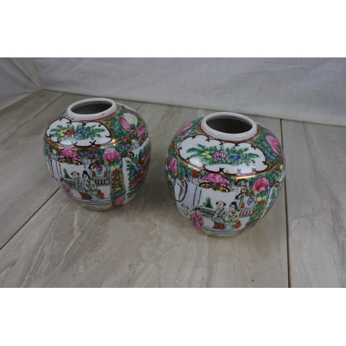 163 - A pair of Oriental hand painted ginger jars, Approx 13cm in height.