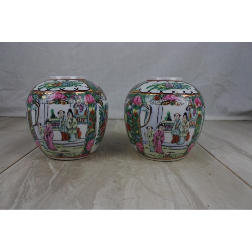 163 - A pair of Oriental hand painted ginger jars, Approx 13cm in height.