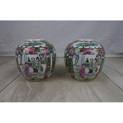 163 - A pair of Oriental hand painted ginger jars, Approx 13cm in height.