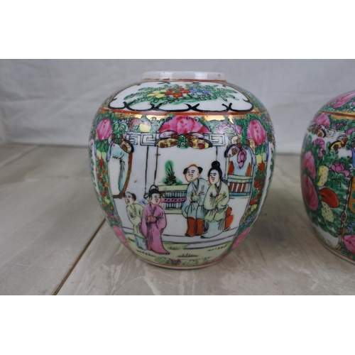 163 - A pair of Oriental hand painted ginger jars, Approx 13cm in height.