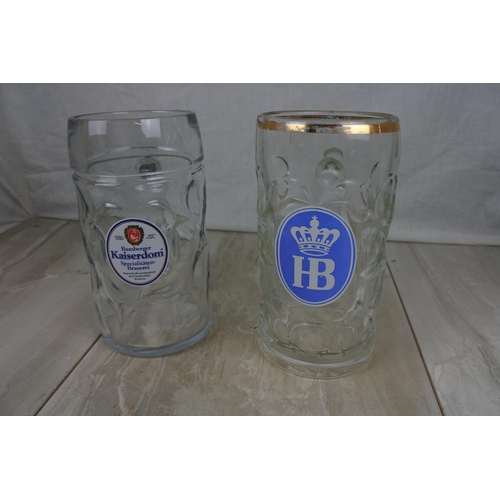 165 - Two large vintage glass beer tankards, Approx 20cm in height.