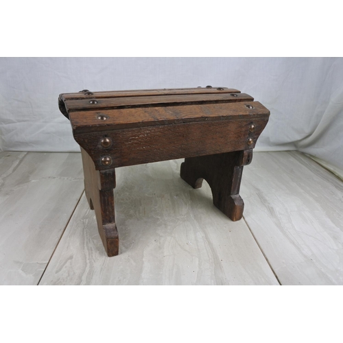 166 - A miniature arch topped oak stool, Approx 28x21x20cm.