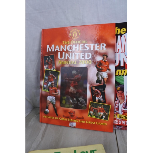 172 - A lot of Manchester United annuals and three Golfing themed books.