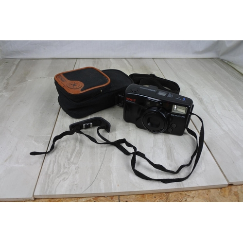 175 - An Olympus camera and carry case.