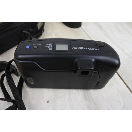 175 - An Olympus camera and carry case.