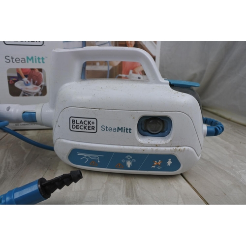 176 - A boxed Black & Decker steam mit.