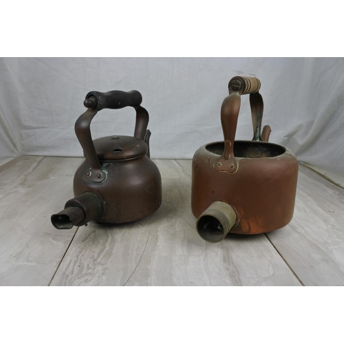 177 - Two antique copper kettles.