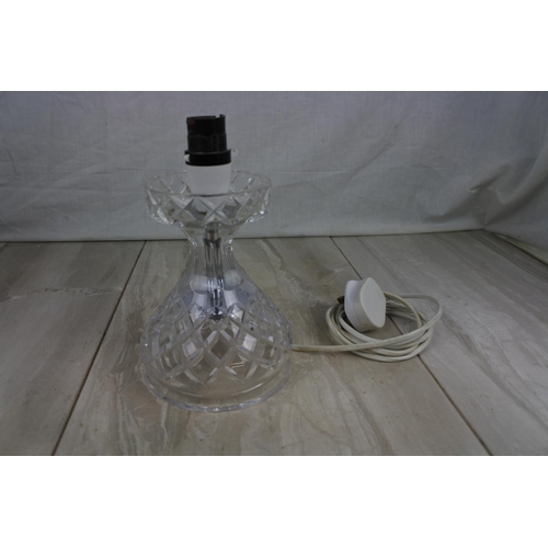 182 - A cut glass table lamp base, Approx 20cm in height.