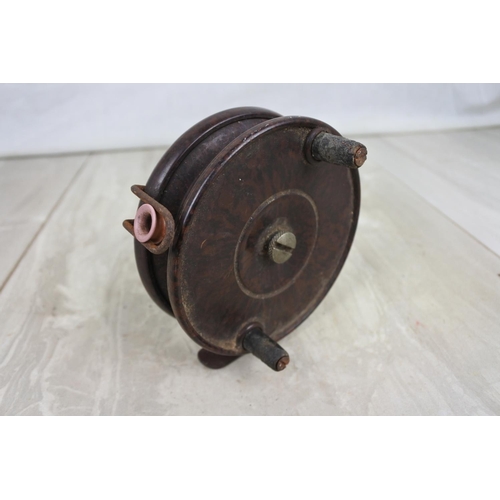 184 - A vintage Bakelite fishing reel.