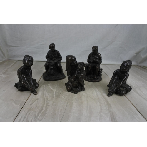 186 - A set of five bronze finish ornamental figures.