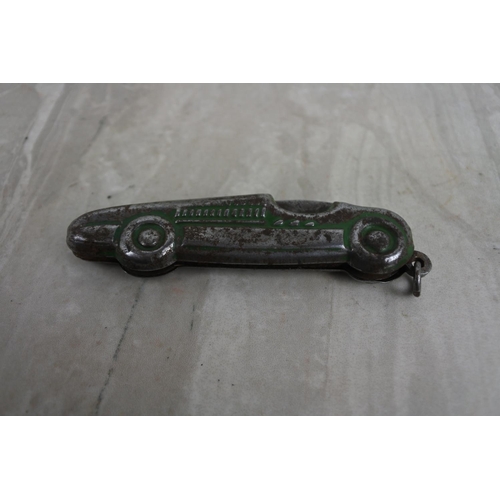 195 - An unusual penknife in the style of a racing car.