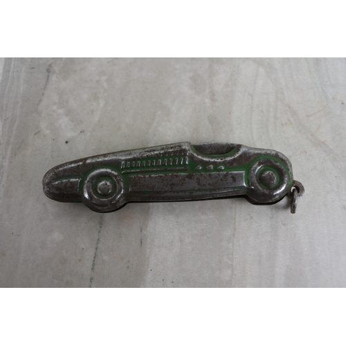 195 - An unusual penknife in the style of a racing car.