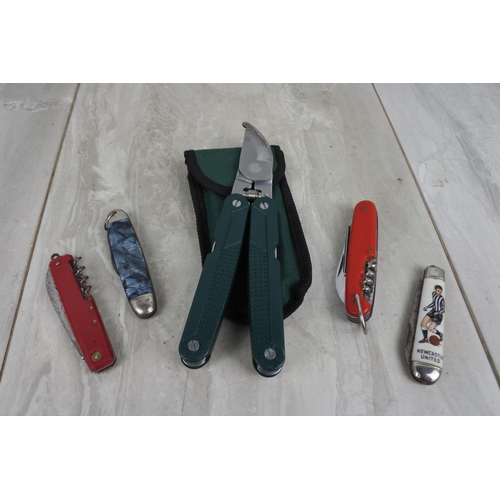 197 - A cased multitool penknife set, a vintage Newcastle United penknife and three others.