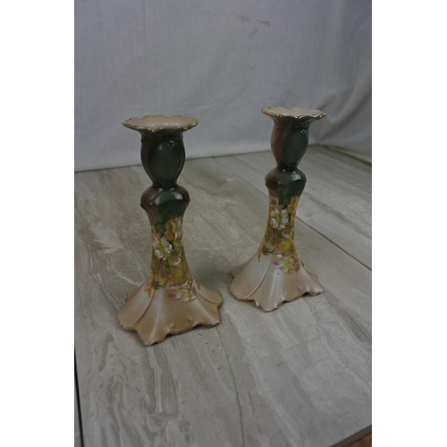 198 - A stunning pair of Austrian ceramic candlesticks, Approx 17cm in height.