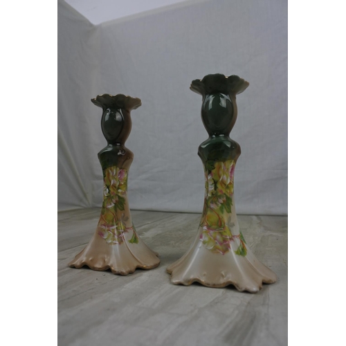 198 - A stunning pair of Austrian ceramic candlesticks, Approx 17cm in height.