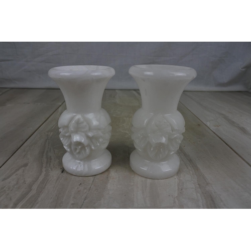 199 - A pair of vintage marble floral candlesticks, Approx 11cm in height.