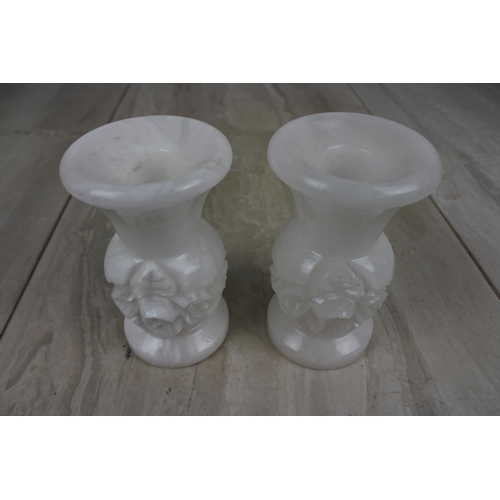 199 - A pair of vintage marble floral candlesticks, Approx 11cm in height.