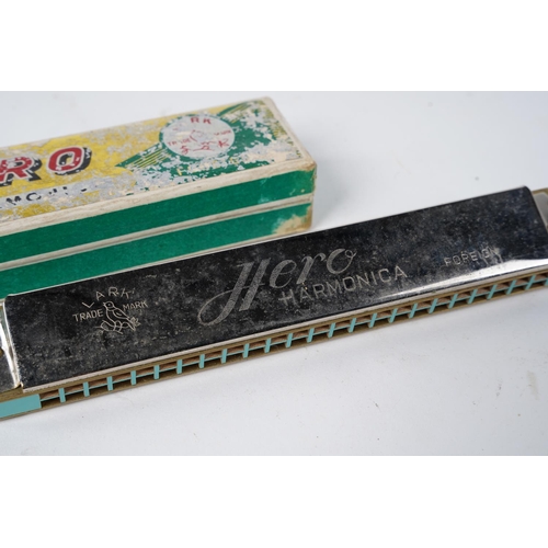 201 - A vintage Hero Harmonica in its original box.