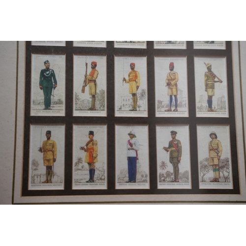 209 - A stunning pair of framed Player Cigarette cards of military figures, Each Approx 36x54cm.