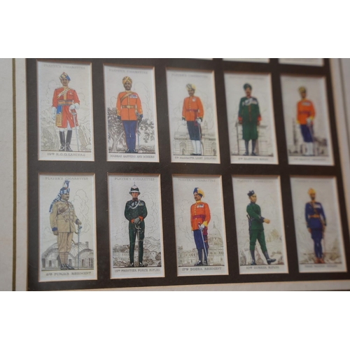 209 - A stunning pair of framed Player Cigarette cards of military figures, Each Approx 36x54cm.