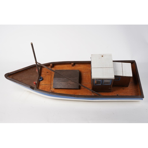 210 - A handmade wooden fishing boat, Approx 60cm in length.