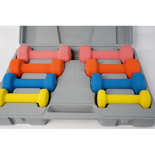 216 - A cased Mirafit dumbbell weight set.