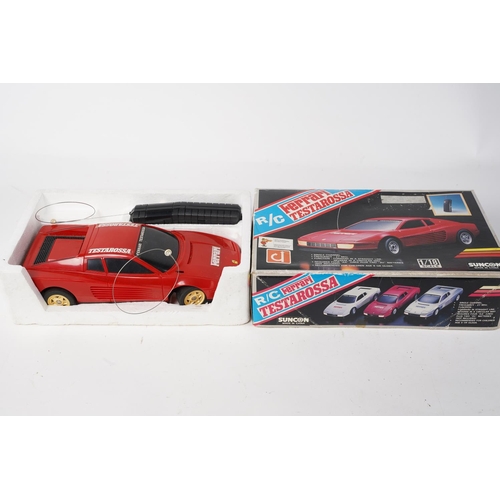 221 - A R\C 1/18 scale model of a Ferrari Testarossa in original card box.