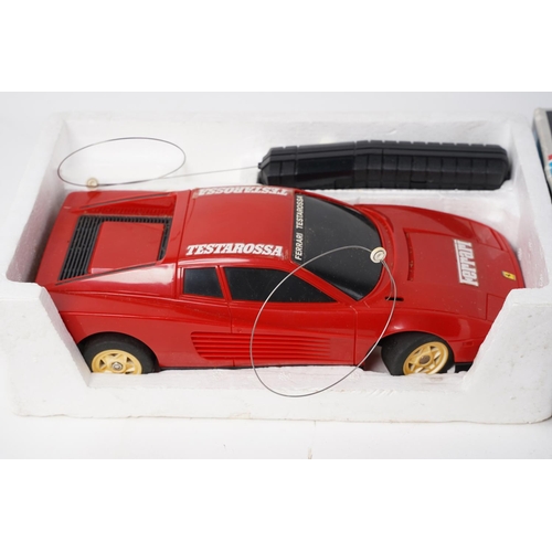 221 - A R\C 1/18 scale model of a Ferrari Testarossa in original card box.