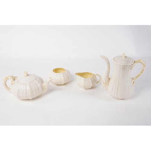 224 - A stunning set of green stamp Belleek ceramics, to include a teapot, coffee pot, milk jug and sugar ... 