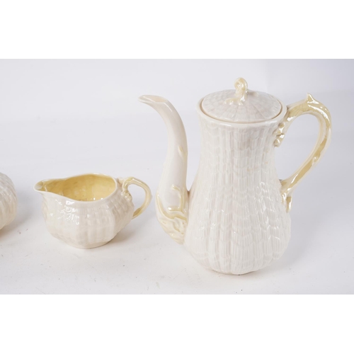 224 - A stunning set of green stamp Belleek ceramics, to include a teapot, coffee pot, milk jug and sugar ... 