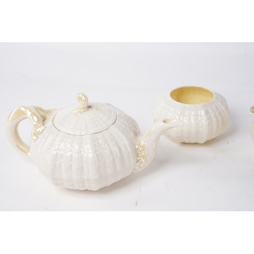 224 - A stunning set of green stamp Belleek ceramics, to include a teapot, coffee pot, milk jug and sugar ... 