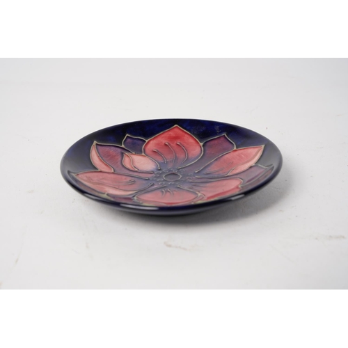 233 - A stunning Moorcroft 'Anemone flower', pin dish, Approx 12cm in diameter.