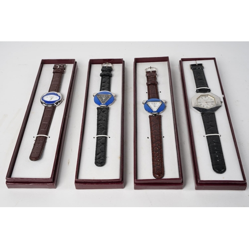 235 - A collection of 4 Millennium 2000 wrist watches in presentation cases designed by Irion - Germany.