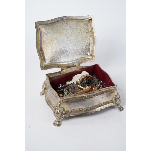 236 - A vintage white metal trinket box with contents, to include a whistle, costume jewellery and more, B... 