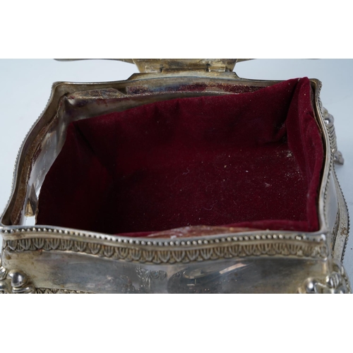 236 - A vintage white metal trinket box with contents, to include a whistle, costume jewellery and more, B... 