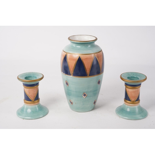 242 - A ceramic vase and matching candlesticks, 'Ports of Call' by Jeff Banks, London, Largest Approx 18cm... 