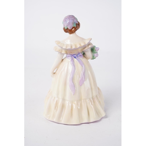 257 - A 1954 Royal Doulton Lady, 'The Bridesmaid', Approx 14cm in height.