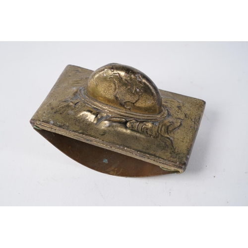 261 - An antique brass ink blotter.