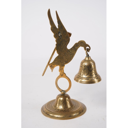 264 - A vintage brass bell, modelled as a bird, Approx 20cm in height.