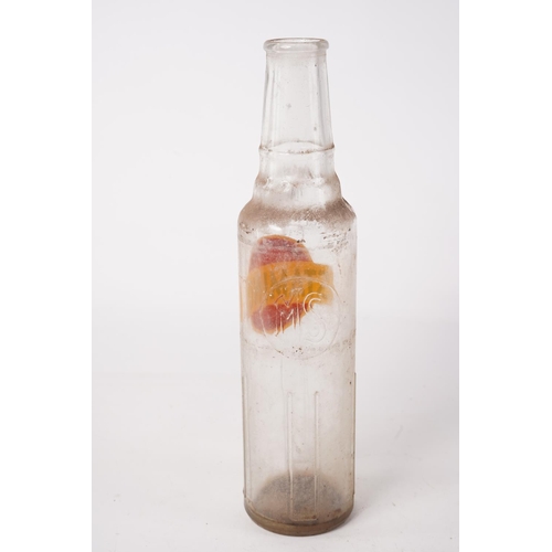 273 - A vintage Premium Grade Staminol motor oil glass bottle, Approx 29cm in height.