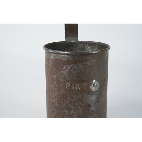 274 - An antique milk ladle, reading, 'PINT GR 40B 46'.