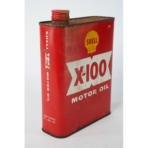 279 - A vintage Shell X-100 motor oil can with contents.