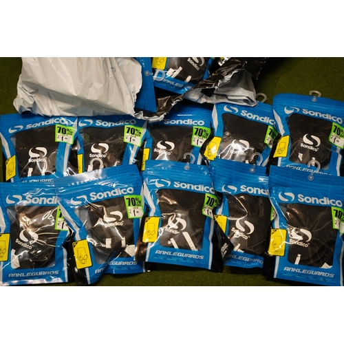 311 - A large lot of new Sondico ankle guards.